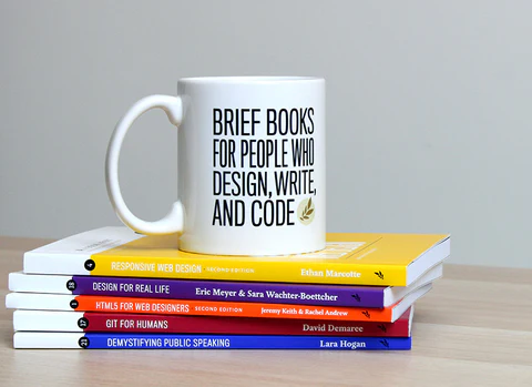 A Book Apart mug and books