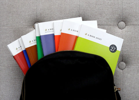 ABA books in a backpack