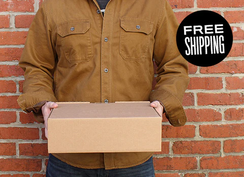 Person holding a shipping box