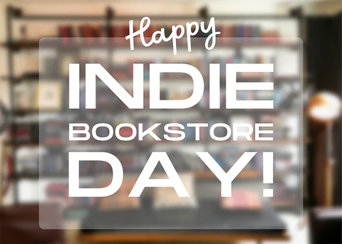 Blurred photo of a bookshelf full of books, with words overlaid that read Happy Indie Bookstore Day!