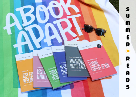 Layout of A Book Apart books on a colorful towel.